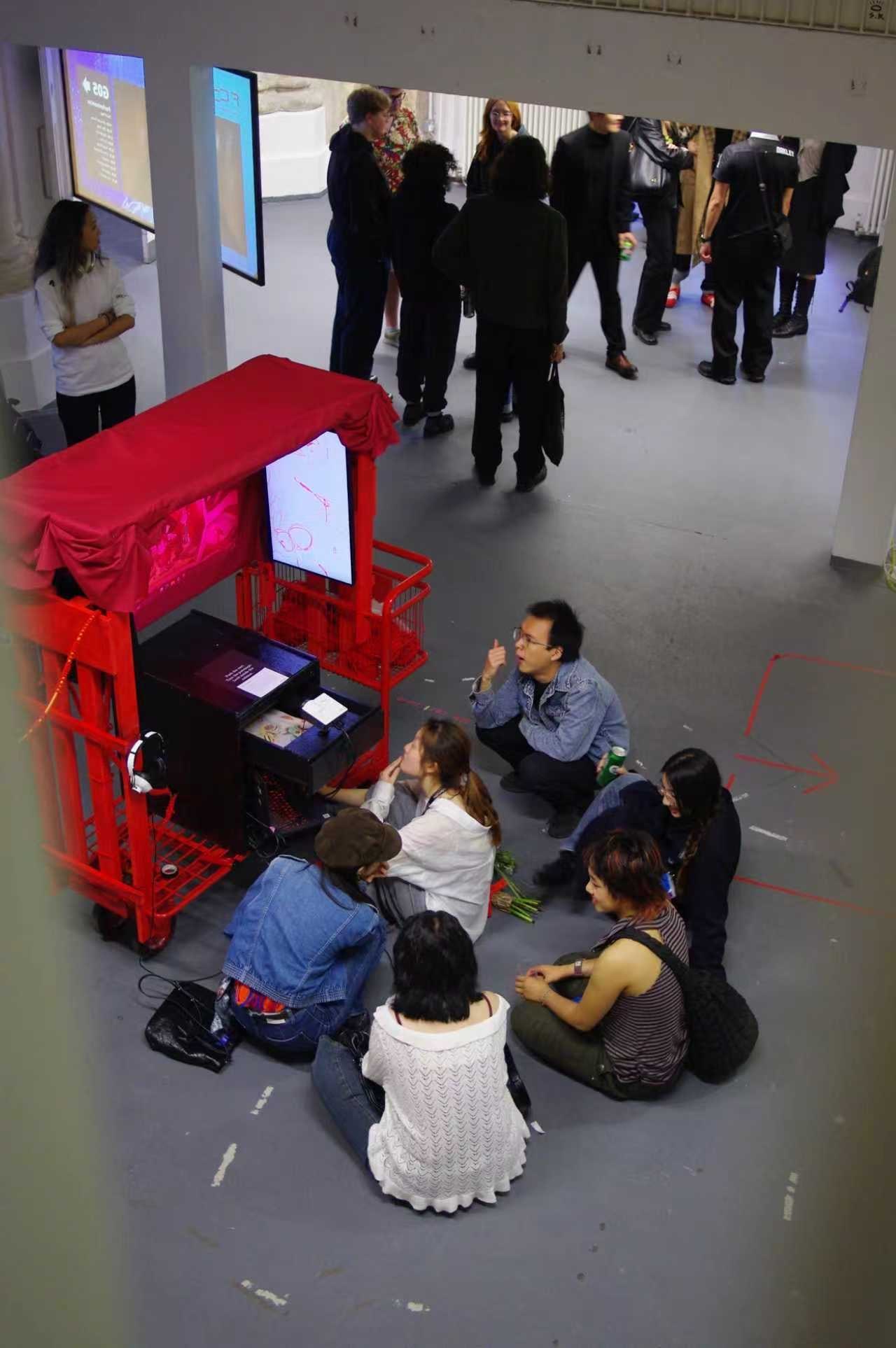 Audience member activating the red pushable cart