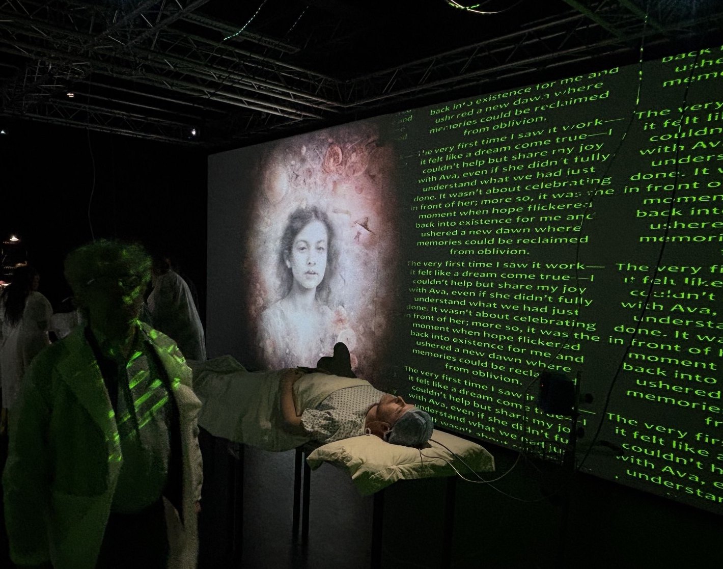 Performer and projection view from What We Leave Behind